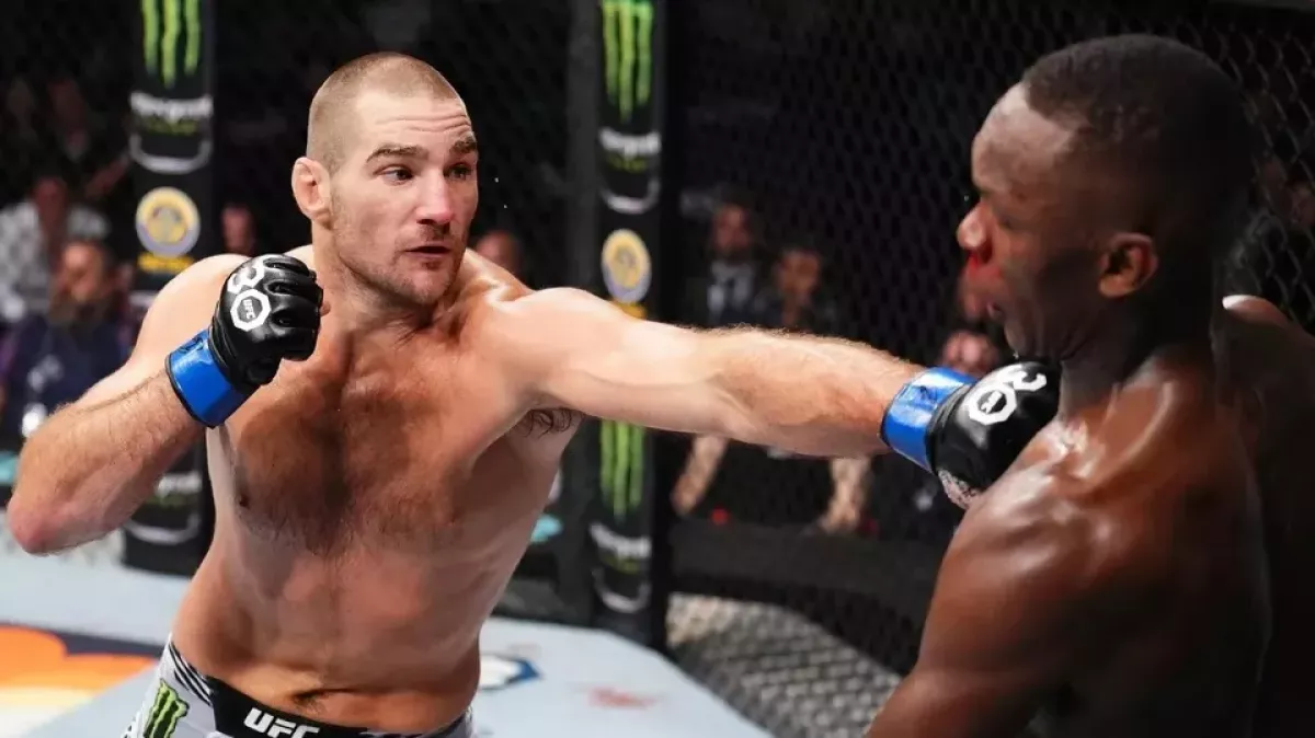 Prostořeký Strickland si rýpnul do kolegy z UFC kvůli manželce, ten mu teď hrozí žalobou